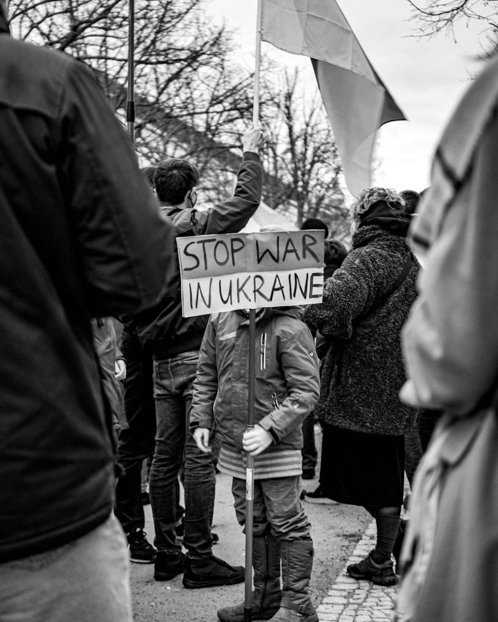 child holding a placard