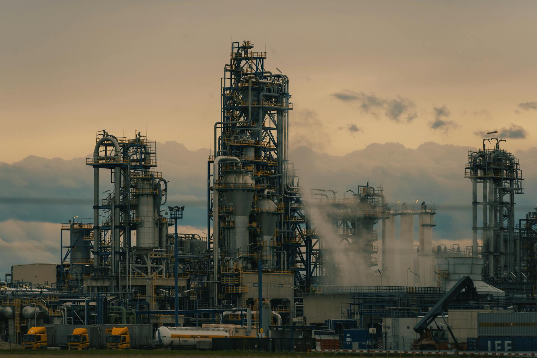 refinery tower at dusk